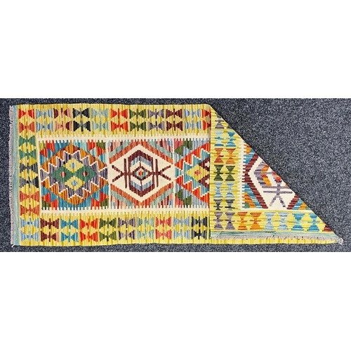 3303 - Rugs and Carpets - a Chobi kilim carpet runner, 153cm x 65cm