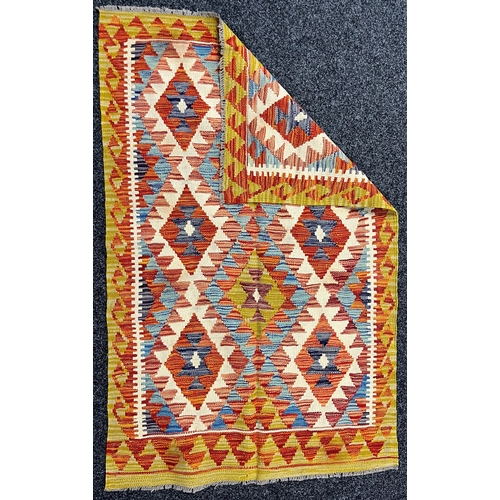 3304 - Rugs and Carpets - a Chobi kilim carpet, 147cm x 94cm