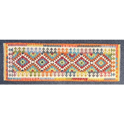 3305 - Rugs and Carpets - a Chobi kilim carpet runner, 207cm x 66cm