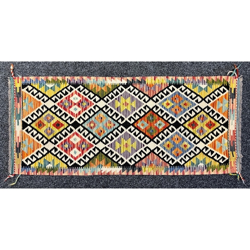 3306 - Rugs and Carpets - a Chobi kilim carpet runner, 154cm x 66cm