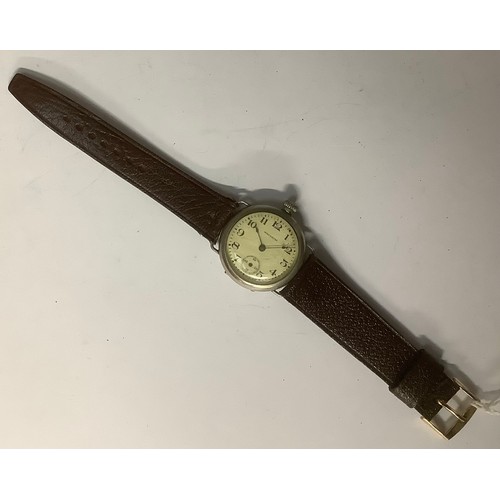 3346 - Watches - a WWI A.W.W. Co. Waltham Mass. trench wristwatch, ivory coloured face, Arabic numerals, se... 