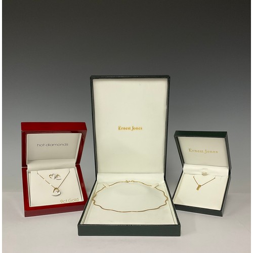 3357 - A 9ct gold choker necklace, marked 375, 5.8g, boxed;  9ct white and yellow gold 