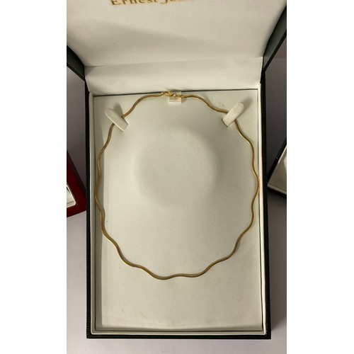 3357 - A 9ct gold choker necklace, marked 375, 5.8g, boxed;  9ct white and yellow gold 