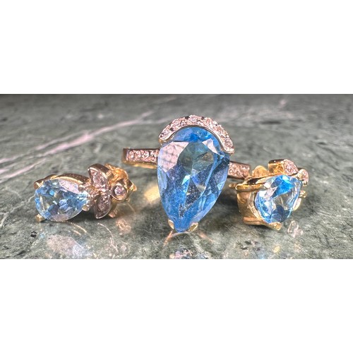 3383 - An aquamarine and diamond ring and earrings