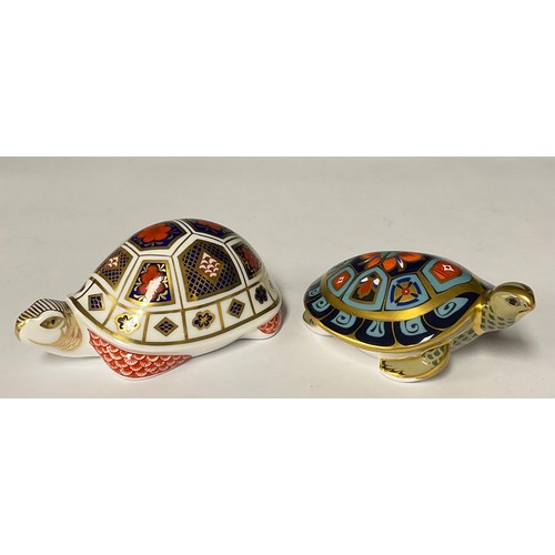 3007 - A Royal Crown Derby paperweight, Turtle, printed in the Imari 1128 pattern, gold stopper; another, T... 