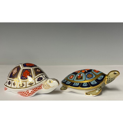 3007 - A Royal Crown Derby paperweight, Turtle, printed in the Imari 1128 pattern, gold stopper; another, T... 