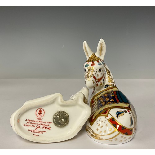 3013 - A Royal Crown derby paperweight, Thistle Donkey, gold stopper, 13.5cm long, printed mark; another Ho... 