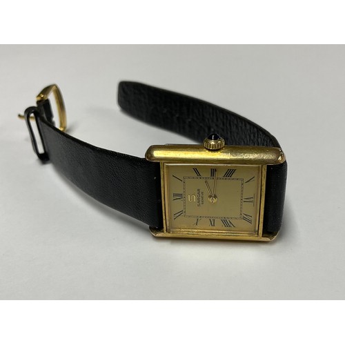 3390 - A lady's Sarcar Geneve gold plated watch, rectangular Champagne dial, Roman numerals, the winder set... 