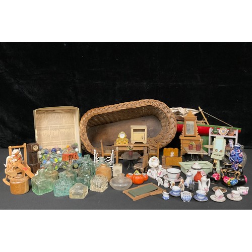 3322A - Toys & Juvenalia - an early 20th century wicker work dolls crib on rocker; a Staryacht pond yacht; a... 