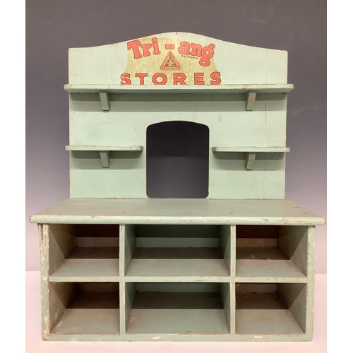 3397 - Toys & Juvenalia - a Tri-ang Stores painted wooden miniature shelving unit; an early 20th century pa... 