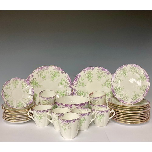 3060A - Ceramics - a Foley china 33 piece tea service decorated with floral patterns, comprising tea cups, s... 