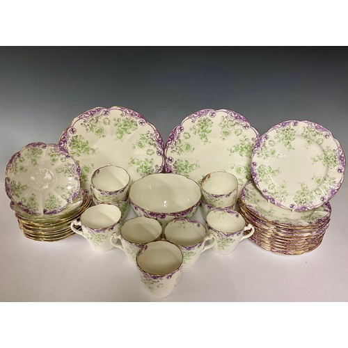 3060A - Ceramics - a Foley china 33 piece tea service decorated with floral patterns, comprising tea cups, s... 