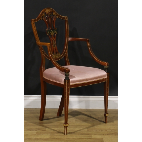 2963 - A Sheraton Revival painted satinwood armchair, shield shaped back with pierced splat, stuffed-over s... 