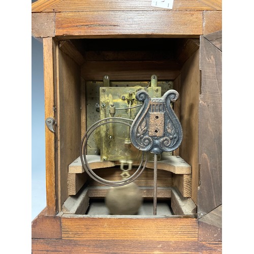 3241A - An Edwardian Oak mantle clock, square brass dial, silvered chapter ring, Arabic numerals, striking o... 