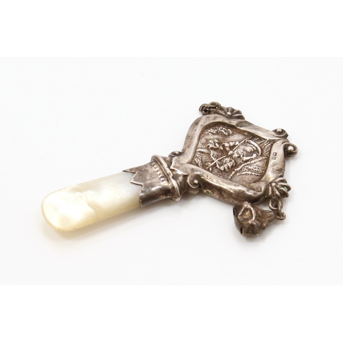 113 - A George V silver and mother of pearl baby's teething rattle, 7.5cm long, Birmingham 1918