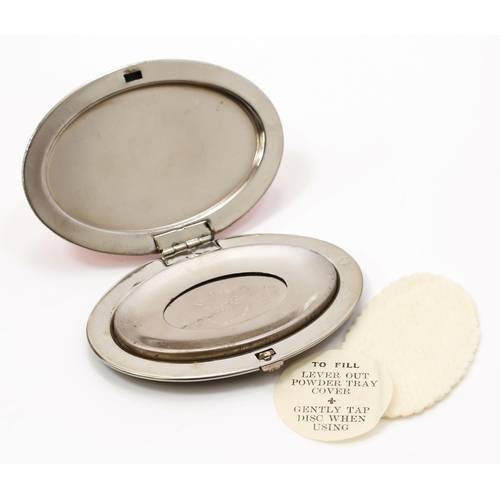 171 - An 'Art Deco' style oval shaped powder compact, by Gwenda, the hinged lid decorated with a bold geom... 