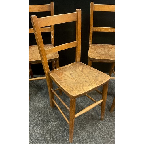 38 - A set of six early 20th century elm and beech chapel chairs, each measuring approx. 85cm high x 35cm... 