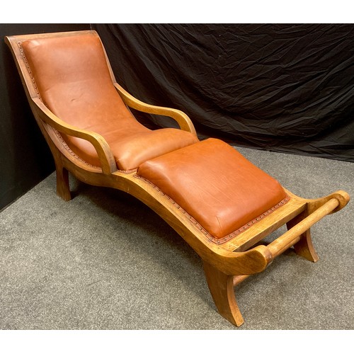 79 - A Walter Knoll style walnut chaise longue, tan leather upholstery, 89cm high x 191cm long x 63cm wid... 