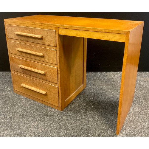 80 - An oak desk, four graduated drawers, 76cm high x 112cm wide x 47cm deep.