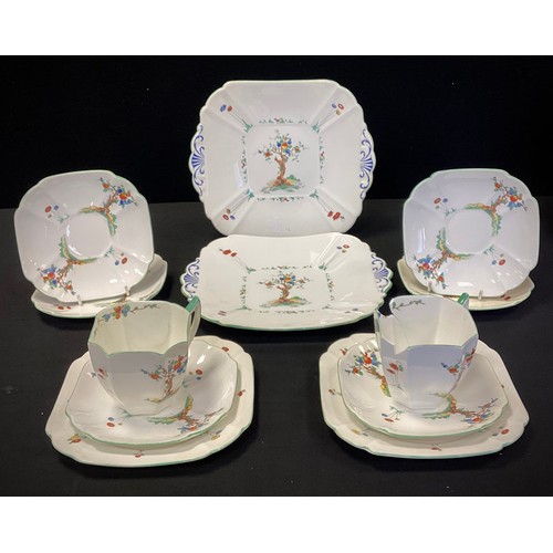 93 - A Shelley ‘Crabtree’ part tea service comprised of; a pair of picnic plates, two tea cups, saucers, ... 