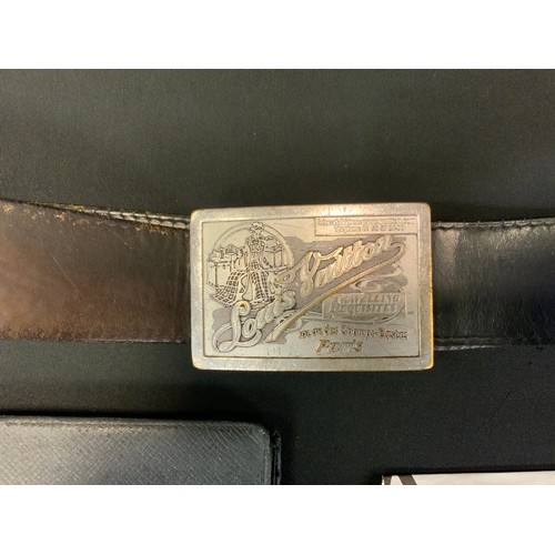 259 - Louis Vuitton - a black leather belt, rectangular Travelling Requisites buckle, ref M6812T, buckle 5... 