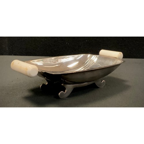 308 - An Art Deco style silver and white Bakelite twin handle shaped rectangular dish, Stone Brothers (Jew... 