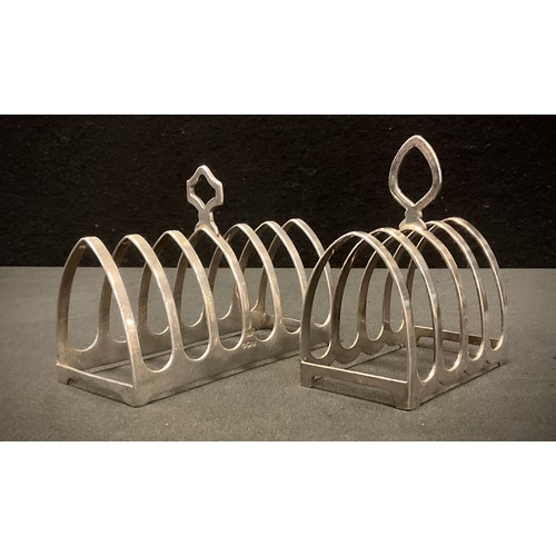 323 - A George V six division toast rack, Viners, Sheffield 1940, another, smaller Birmingham, 1959, 129.0... 