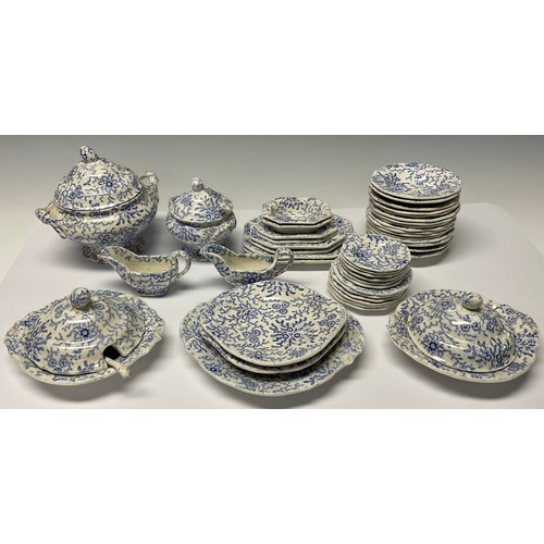 63 - A 19th century doll's miniature dinner service, transfer printed in underglaze blue, c.1860