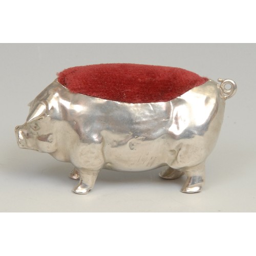 122 - An Edwardian silver novelty pin cushion, as a pig, 5.5cm long, Levi & Salaman, Birmingham 1904