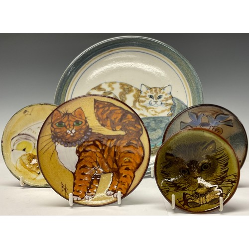 145 - A Highland Stoneware plate, painted with a cat resting on a cushion; four smaller Chelsea Pottery di... 