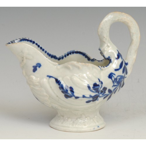 167 - A Liverpool dolphin ewer cream jug, in relief with shell moulding, the spout with entwined dolphins,... 