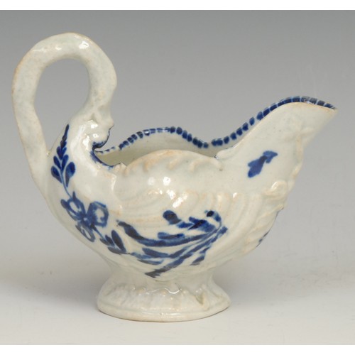 167 - A Liverpool dolphin ewer cream jug, in relief with shell moulding, the spout with entwined dolphins,... 