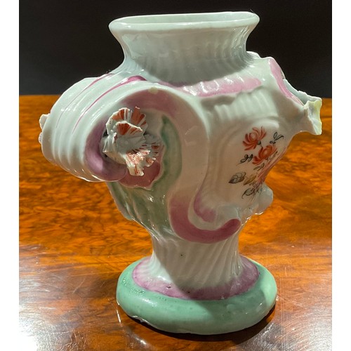 249 - A Longton Hall asymmetric Rococo style pedestal vase, painted with flowers within moulded cartouches... 