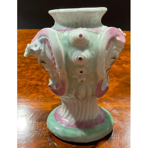 249 - A Longton Hall asymmetric Rococo style pedestal vase, painted with flowers within moulded cartouches... 