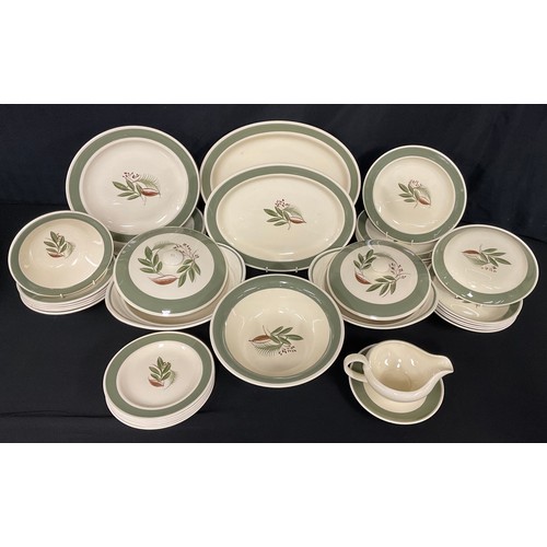 323 - A Susie Cooper Ferndown pattern dinner service comprising, pair of vegetable dishes and covers, sauc... 