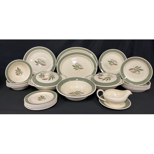 323 - A Susie Cooper Ferndown pattern dinner service comprising, pair of vegetable dishes and covers, sauc... 