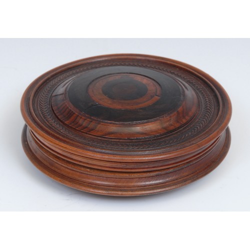 385 - Treen - a large 19th century draught-turned specimen timber circular snuff box, 11cm diam