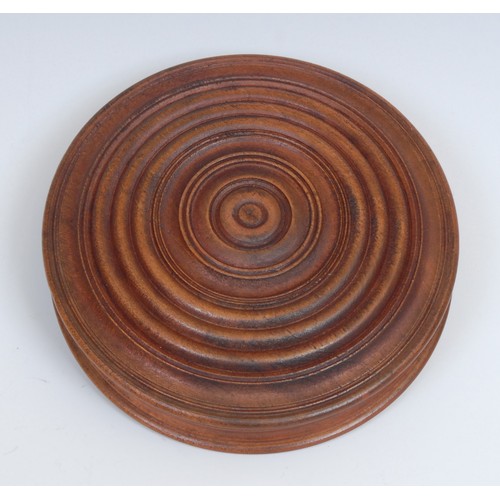 385 - Treen - a large 19th century draught-turned specimen timber circular snuff box, 11cm diam