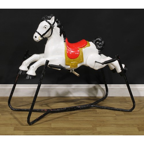 199 - Toys & Juvenalia - a 1960's painted pressed steel rocking horse on springs, mounted upon a frame, 10... 