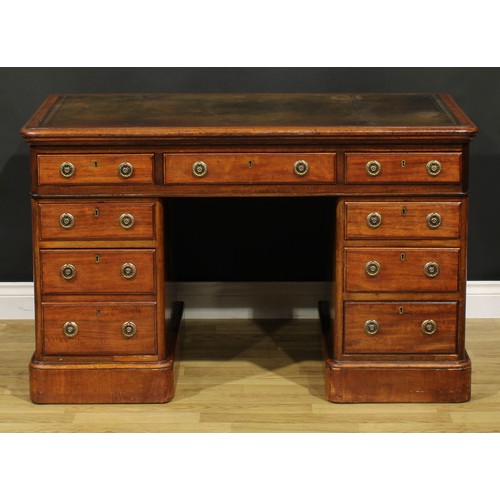 184 - A Victorian mahogany twin pedestal desk, rectangular top with inset tooled and gilt writing surface ... 