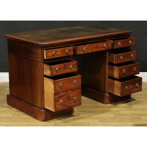 184 - A Victorian mahogany twin pedestal desk, rectangular top with inset tooled and gilt writing surface ... 