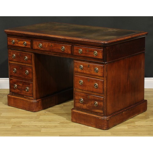 184 - A Victorian mahogany twin pedestal desk, rectangular top with inset tooled and gilt writing surface ... 