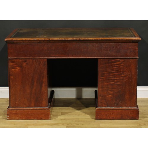 184 - A Victorian mahogany twin pedestal desk, rectangular top with inset tooled and gilt writing surface ... 