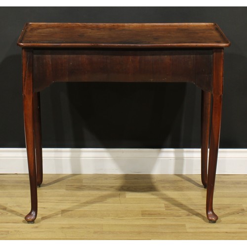 186 - A George II mahogany silver table, dished rounded rectangular top above a long frieze drawer, shaped... 