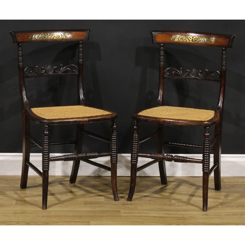 194 - A pair of Post-Regency beech and brass marquetry side chairs, each with a cane seat, ring-turned for... 