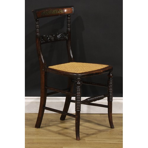 194 - A pair of Post-Regency beech and brass marquetry side chairs, each with a cane seat, ring-turned for... 