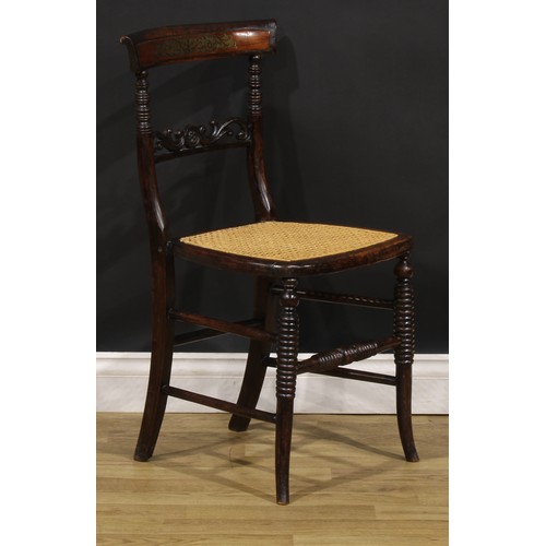 194 - A pair of Post-Regency beech and brass marquetry side chairs, each with a cane seat, ring-turned for... 