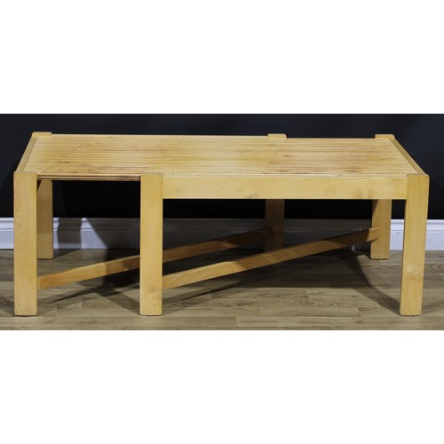 197 - A mid-20th century design American beech and oak expanding coffee table, in the manner of John Keal ... 