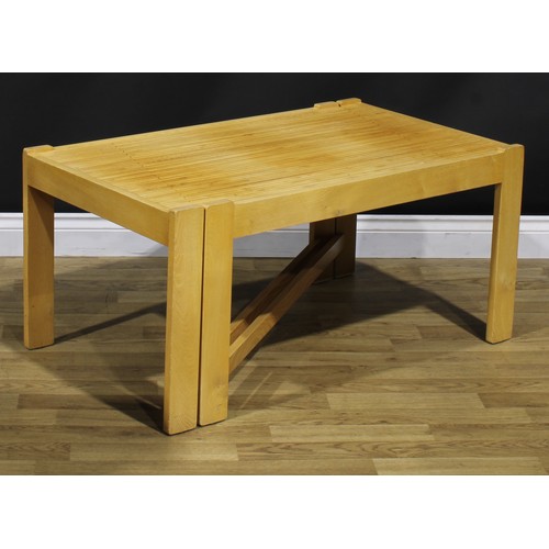 197 - A mid-20th century design American beech and oak expanding coffee table, in the manner of John Keal ... 