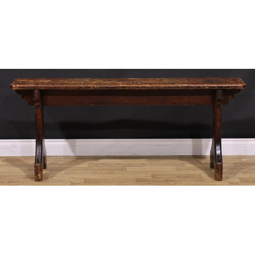 277 - A late Victorian Gothic Revival vernacular pine bench, chamfered rectangular top, shaped end support... 